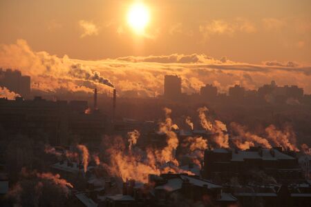 Industrial buildings at sunset skyの写真素材