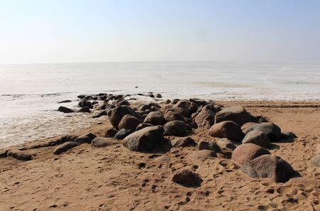 Snow of sea and sandy beachの写真素材