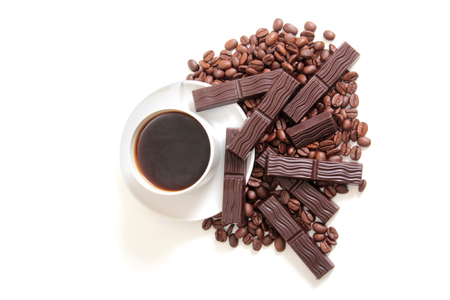 Coffee cup and chocolate on a white backgroundの写真素材