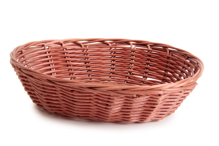 Wicker basket for bread on white backgroundの写真素材