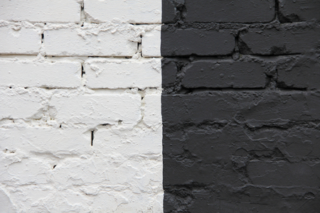 Old brick wall with paintの写真素材