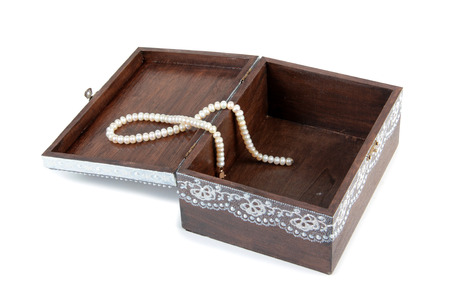 Wooden painted box on whiteの写真素材