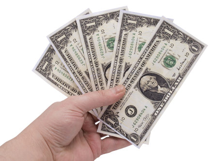 Paper dollars in hand on white background