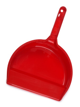 Red plastic scoop on a white backgroundの写真素材