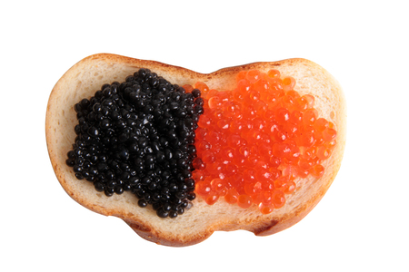 Fish eggs and bread on a white backgroundの写真素材