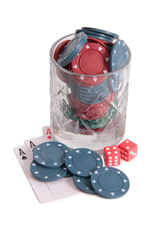 Cards and chips for casino in glass with on white background