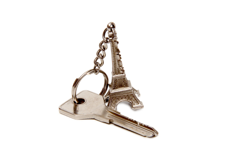 Keychain and apartment keys on a white backgroundの写真素材