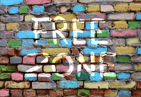 Words free zone on an old colored brick wallの写真素材