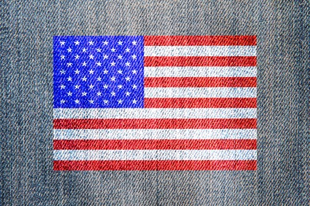 American flag on a denim fabric backgroundの写真素材
