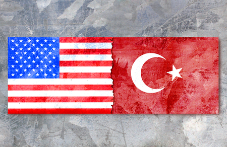 Flags of america and turkey is painted on a rusty metalの写真素材