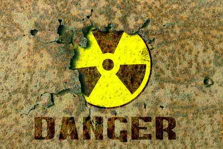 Sign of radiation in camouflage surfaceの写真素材