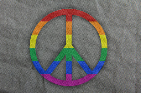Sign of peace in a rainbow