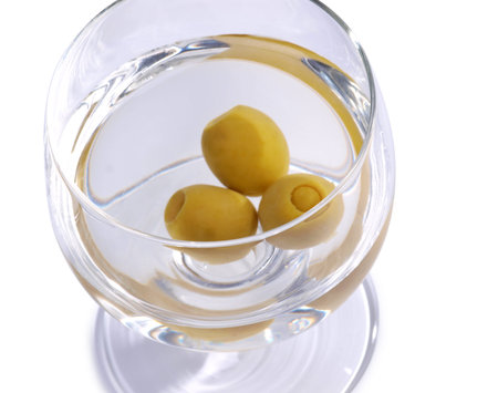 Green olives in glassの写真素材