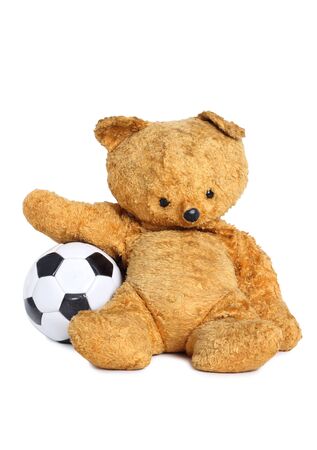 Old teddy bear with ballの写真素材