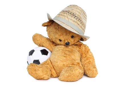 Old teddy bear with ballの写真素材