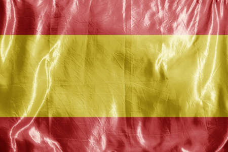 State flag fluttering in the wind. Colored background on textilesの写真素材
