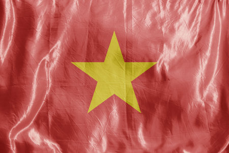 State flag fluttering in the wind. Colored background on textilesの写真素材