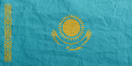 State flag fluttering in the wind. Colored background on textilesの写真素材