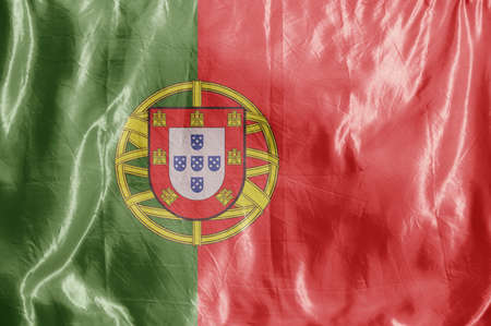 State flag fluttering in the wind. Colored background on textilesの写真素材