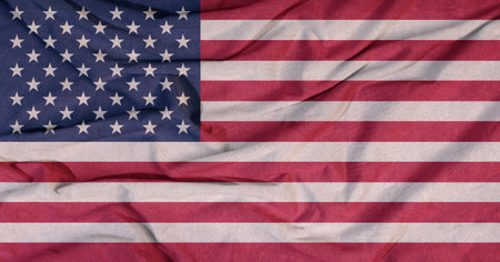 State flag fluttering in the wind. Colored background on textiles