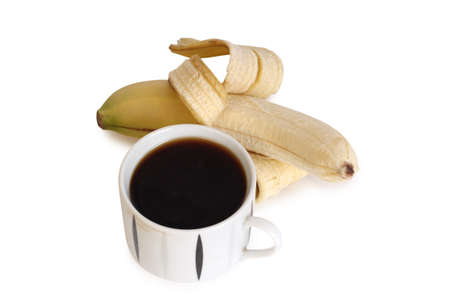 Ripe yellow banana and cup of coffee on white background. Ingredients for cookingの写真素材