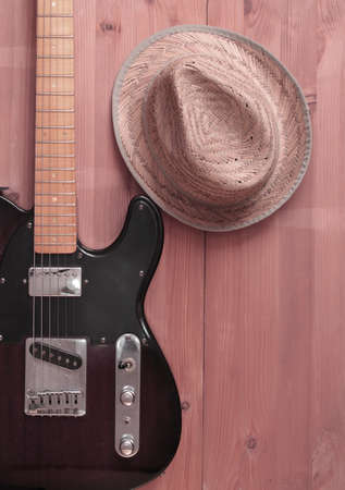 Vintage country mandolin and hat on wooden backgroundの写真素材