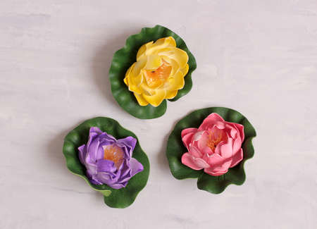 Soap in form of rose buds on stone backgroundの写真素材