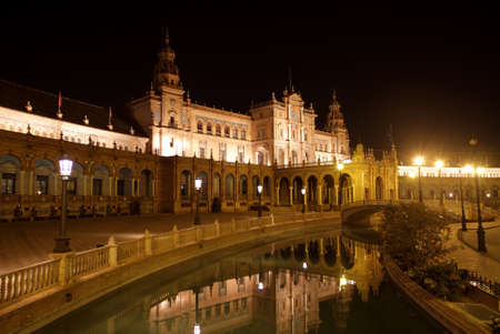 historic building in the night sky, the reflection of light in waterの写真素材