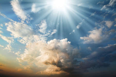 rays of light on the rich dark clouds. blue skyの写真素材