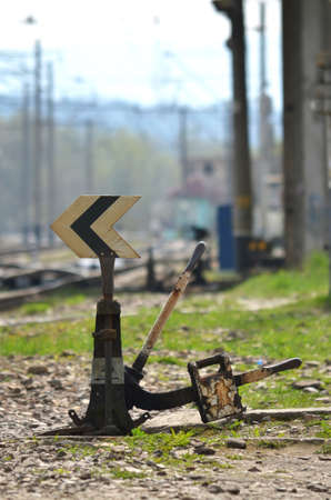 Railroad tracks. Old railroad switch in the foregroundの写真素材