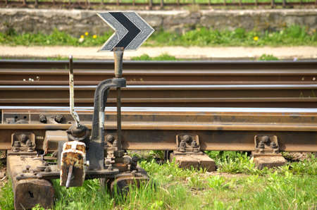 Railroad tracks. Old railroad switch in the foregroundの写真素材