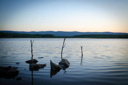 Beautiful evening on the lake at summerの写真素材
