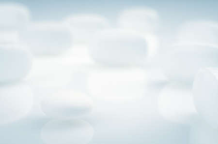 Closeup. Pharmacy theme. White Pills on the White Backgroundの写真素材