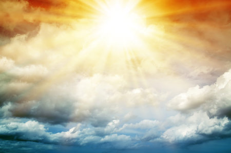 Abstract. Fog and clouds looking up into a fantasy multicolored sky. The bright red sun illuminates...