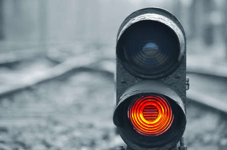 Traffic light shows red signal on railway. Red lightの写真素材