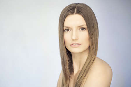 Elegant nude girl with magnificent hair  Studio portrait の写真素材