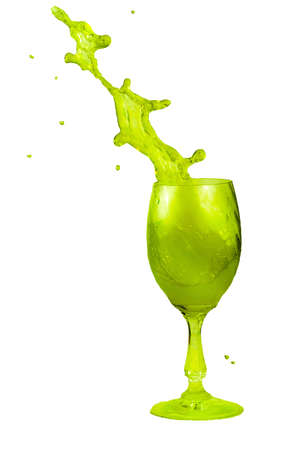 Sloped green drink in a glassの写真素材