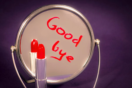 The inscription on the mirror written in lipstickの写真素材