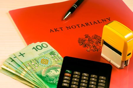 Notarial act with a stamp and a pen