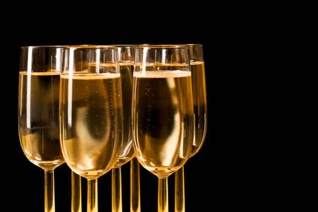 Glasses of champagne on a black backgroundの写真素材
