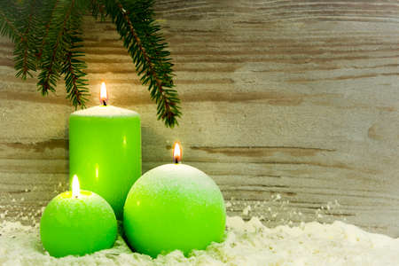 Christmas advent wreath with burning candlesの写真素材