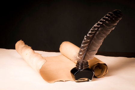 Scroll of parchment, and a pen and inkwellの写真素材
