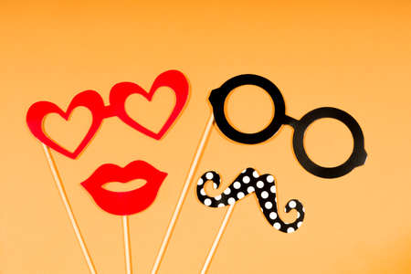 Party, love and wedding concept. Artificial props for woman and man to hold.の写真素材