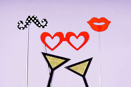 Party, love and wedding concept. Artificial props for woman and man to hold.の写真素材