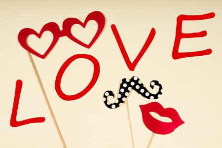 Paper people together in love on a bright color background