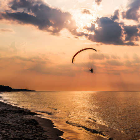 The concept of travel and rest at the seaside, sea waves on the background of the beachの写真素材