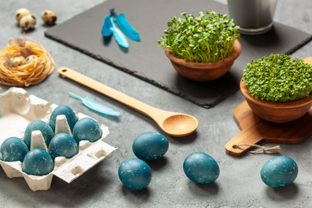 Easter composition - eggs naturally bred in blue with red cabbage