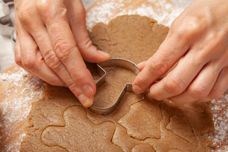 Christmas - making homemade gingerbread for Christmas - punchingの写真素材