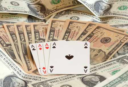 four aces against background made of dollars