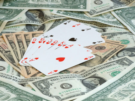 hearts poker against background made of dollars